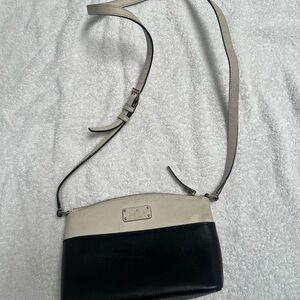 Kate spade Black Leather Crossbody Bag with Adjustable Strap and Gold Accents